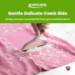 Hand using the Evercare DUO delicate comb side on a pink knit cardigan with visible lint removal debris