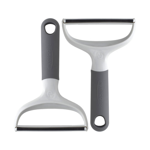 Two gray-and-white Evercare dual-sided lint combs shown on a white background, metal and delicate edges visible