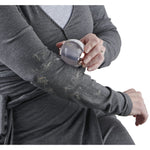 Person using the Evercare gel lint roller ball on a grey garment covered in pet hair to remove lint