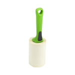 Evercare green-handled lint roller standing upright with plain refill roll against white background