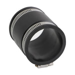 Angled view into a black flexible PVC coupling showing inner bore and stainless clamp bands