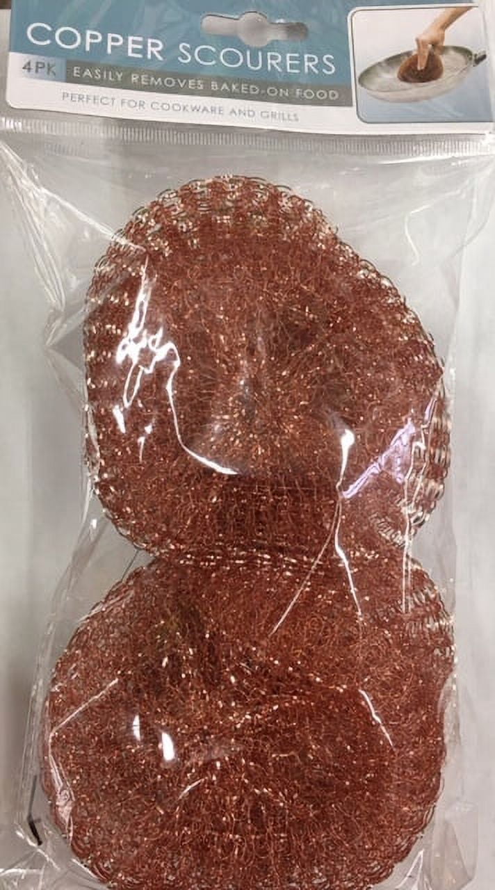 Clear-packaged copper scourers with product header card labeled 'Copper Scourers', two copper scrub pads visible through plastic