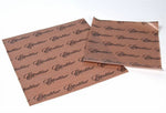 Two brown Excalibur Paraflexx dryer sheets printed with repeating brand script, laid flat on a white background.