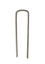 Close-up studio shot of a single U-shaped metal landscape pin with pointed ends on a white background.