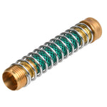 Close-up of a brass garden hose kink-preventing metal spring connector with green hose core