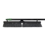 Close-up of broom head laid flat, showing dual-bristle 24-inch head and handle attachment