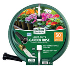 Coiled green Expert Gardener light-duty garden hose with branded circular packaging showing flowers and product details