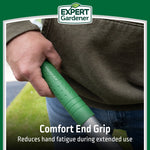 Close-up of a hand gripping the green comfort end grip of an Expert Gardener rake, branded header visible
