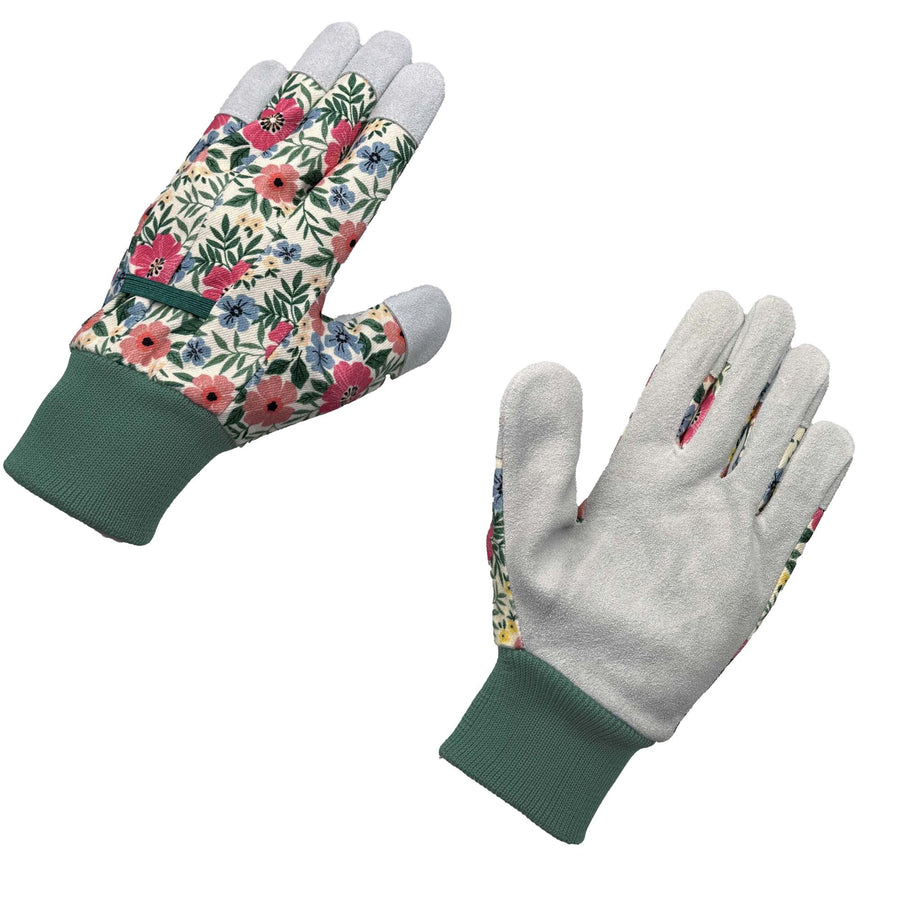 Pair of floral-patterned gardening gloves with grey leather palms and green knit wrists on white background