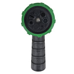 Front-facing view of a green-edged multi-pattern spray face and black ribbed handle