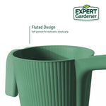Close-up of green fluted watering can rim and handle with 'Fluted Design' text and Expert Gardener logo.