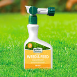 Expert Gardener Liquid Weed & Feed bottle placed on bright green grass with blurred background