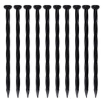 Ten black twisted no-dig nylon garden anchor spikes lined up vertically on a plain white background.