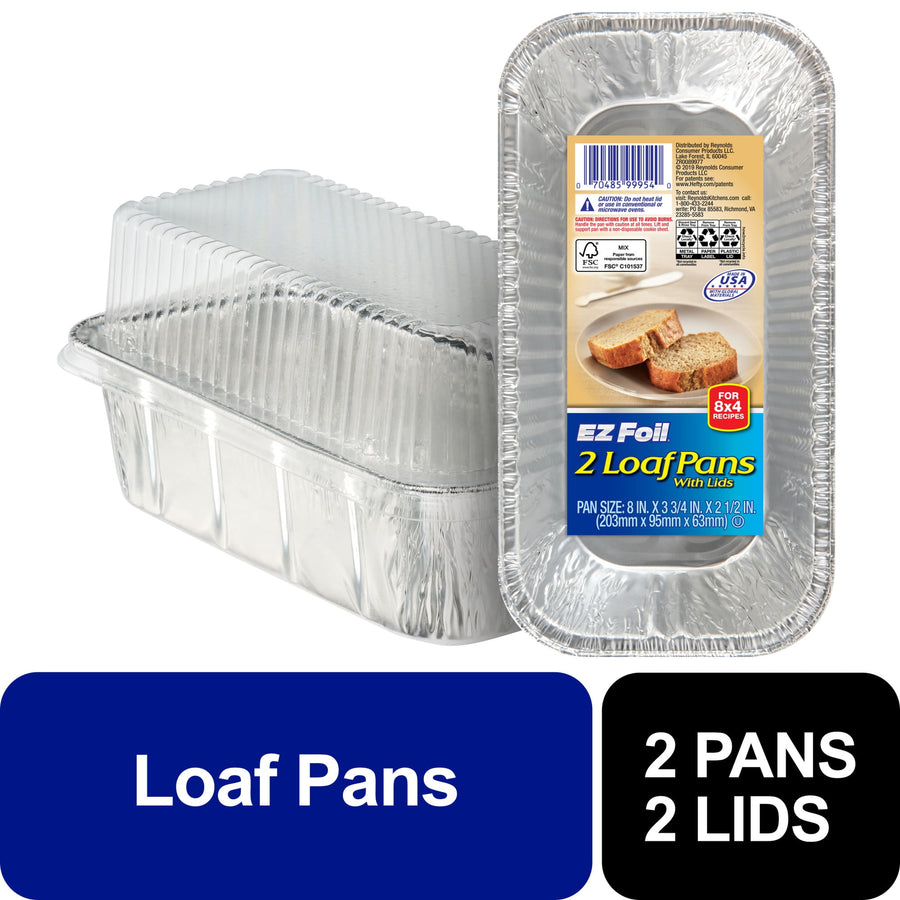 Two disposable aluminum loaf pans with clear plastic lids and a front package label showing product branding