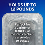 Top-down view of an empty EZ Foil aluminum pan with text overlay stating it holds up to 12 pounds and suits various dishes
