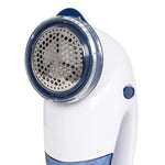 Front view close-up of the perforated stainless shaving head and protective trim on a fabric shaver