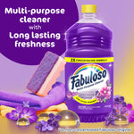 Purple Fabuloso 2X cleaner bottle with sponge, cloths and lavender flowers with text highlighting long lasting freshness
