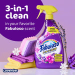 Fabuloso lavender 3-in-1 spray bottle styled with cleaning cloths, sponge and lavender sprig on purple background