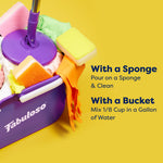 Close-up of a purple mop bucket filled with sponges, gloves and mop head with text showing sponge and bucket usage instructions.