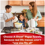Family in a kitchen using Scott paper towels while baking, with product messaging at bottom