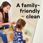 Lifestyle photo of an adult and child at a bathtub with overlay text "A family-friendly clean" promoting gentle household cleaning