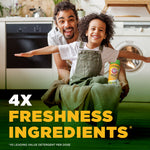 Smiling adult and child in a laundry room holding a basket with an Arm & Hammer Clean Scentsations bottle visible, promotional text overlay.