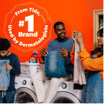 Family folding laundry in a laundry room with a Tide bottle visible and a badge claiming ‘#1 Brand’