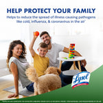 Smiling family with child and dog in living room with 'Help Protect Your Family' header and Lysol logo overlay