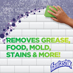 Graphic tile background with hand scrubbing and bold text: removes grease, food, mold, stains & more