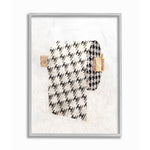 Framed stylized toilet-paper roll art print with repeating Chanel-like logo pattern and glitter accents on a light textured background.