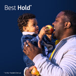 Father holding a child who offers him an apple, paired with text “Best Hold” on a navy background for Fixodent advertising.