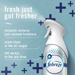 Close-up of a Febreze Air Mist bottle with white trigger and text highlighting fresher scent and product benefits