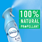 close-up of a blue febreze air mist spray bottle releasing mist beside text reading 100% natural propellant