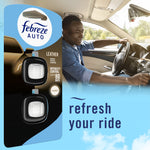 Lifestyle image showing a person driving with Febreze AUTO Leather twin-pack packaging graphic and refresh your ride text