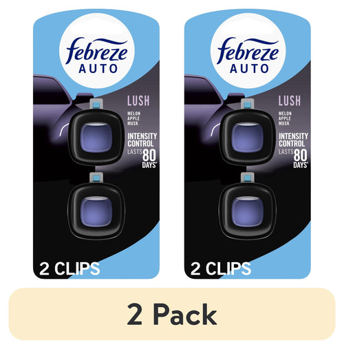 Two Febreze AUTO Lush car vent clip packages showing black clips with purple refill windows on blue card