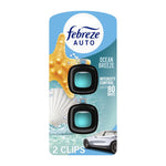 Febreze AUTO Ocean Breeze twin-clip car air freshener blister pack with teal fragrance pods and ocean-themed background