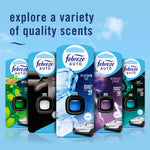 Row of different Febreze Auto vent clip packages showcasing a variety of scents and packaging designs against a blue background