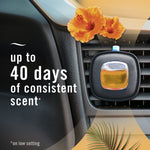 Febreze AUTO vent clip attached to a car air vent with hibiscus flowers and text stating up to 40 days of consistent scent