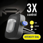 Close-up product graphic of Febreze Auto vent clip showing intensity dial and labeled high, medium, low settings