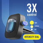 Close-up stylized product render of a Febreze Auto vent clip with intensity dial graphic and 3X control callout
