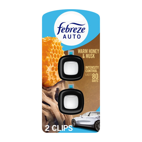 Febreze Auto Warm Honey & Musk vent clip twin pack on retail backing showing honeycomb and car graphic