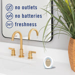 Bathroom vanity scene with a Febreze Bathroom device on the counter and text icons reading no outlets, no batteries, 24/7 freshness