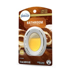 Front product shot of Febreze Bathroom Pumpkin Roll air freshener blister pack with visible oval yellow refill