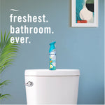 A single Febreze Air Mist bottle placed on a toilet tank in a staged bathroom scene with text 'freshest. bathroom. ever.'