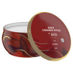 Red Febreze candle tin with lid angled forward showing product text and 11 oz marking on back