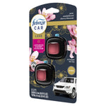 Angled view of Febreze Car Luxe Japanese Cherry Blossom packaging showing product details and a car image