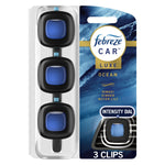 Packaged Febreze Car Luxe Ocean vent-clip trio on blue ocean-themed backing with intensity dial callout
