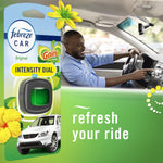 Lifestyle image combining Febreze Car packaging with a smiling driver inside a car and 'refresh your ride' text