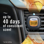 Febreze Car vent clip attached to a vehicle air vent with text claiming up to 40 days of consistent scent