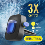 Close-up product render of a Febreze Car vent clip showing the intensity dial and 3x control graphic on a blue wave background